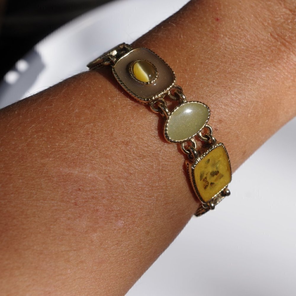 Women`s gold tone green/yellow panel bracelet